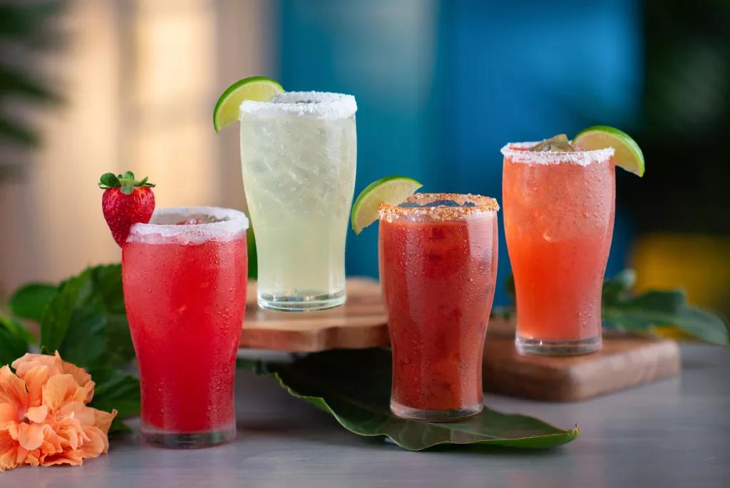 Salted Rims 4 pint glasses filled with different flavoured margaritas