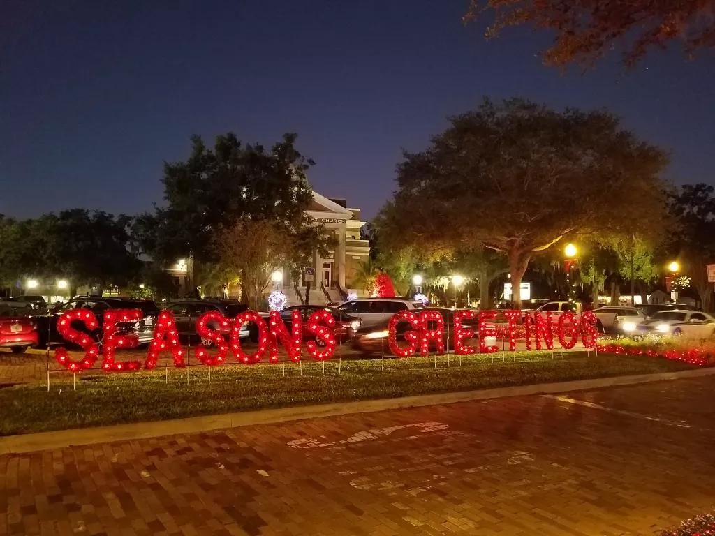 Christmas at Winter Garden Large illuminated letters spelling out "Seasons Greetings"