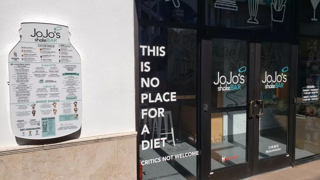 JoJo's ShakeBar The door of JoJo's ShakeBar reading "This is no place for a diet"