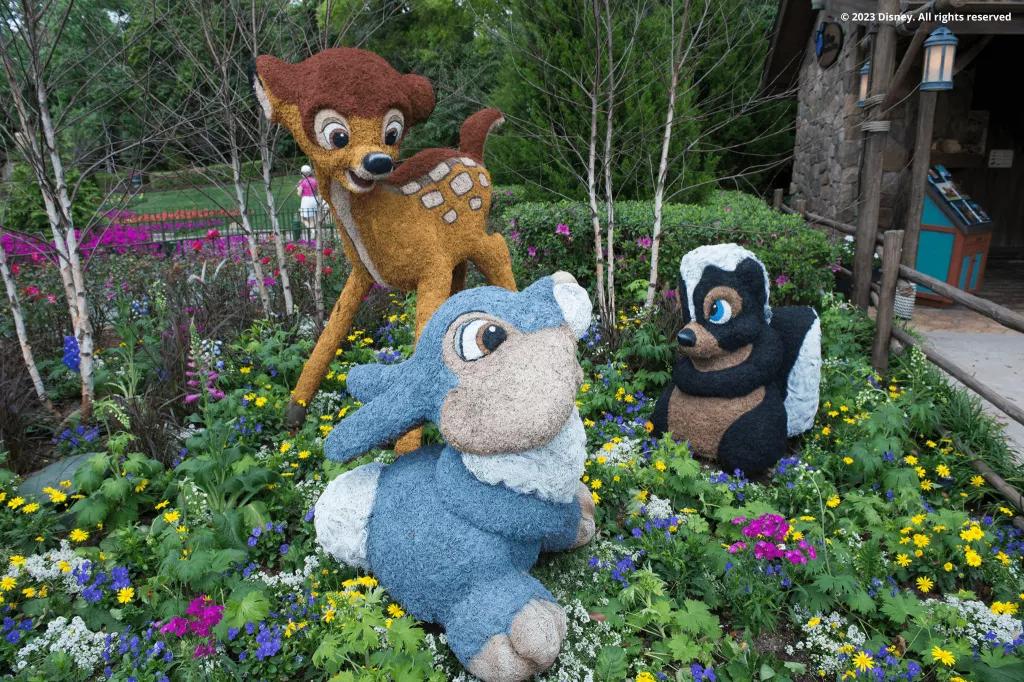 Topiaries at the International Flower & Garden Festival Topiaries of Bambi, Thumper and Flower in a flower bed