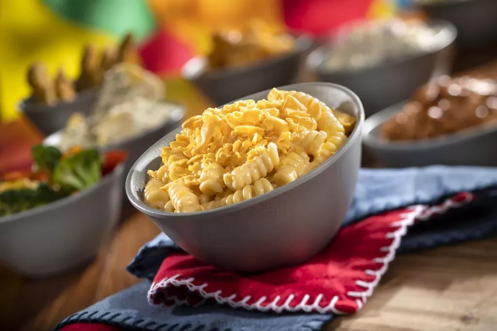 Slinky Dog Mac and Cheese A metal bowl full of mac and cheese