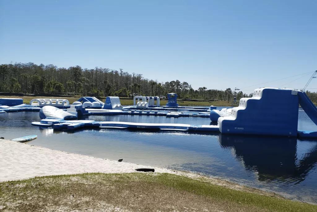 Nona Adventure Park An aquatic climbing course of inflatable rafts on a large expanse of water