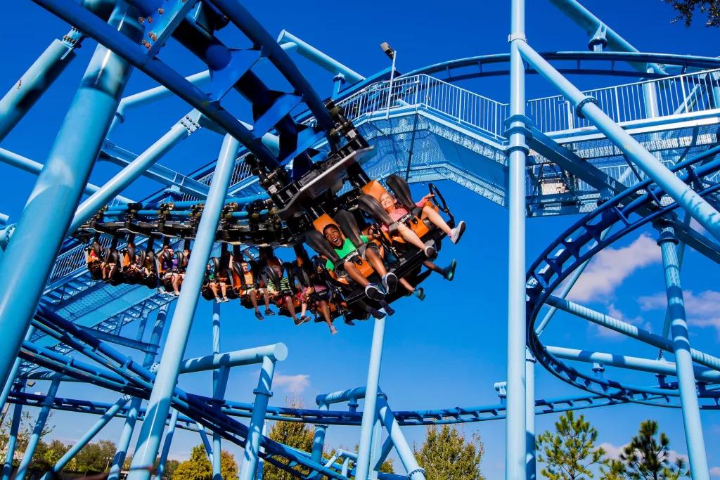 LEGOLAND Florida Flying School Children on a suspended rollercoaster with a pale blue track
