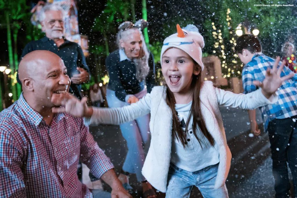 Christmas at Hollywood Studios Guests smiling in the snow