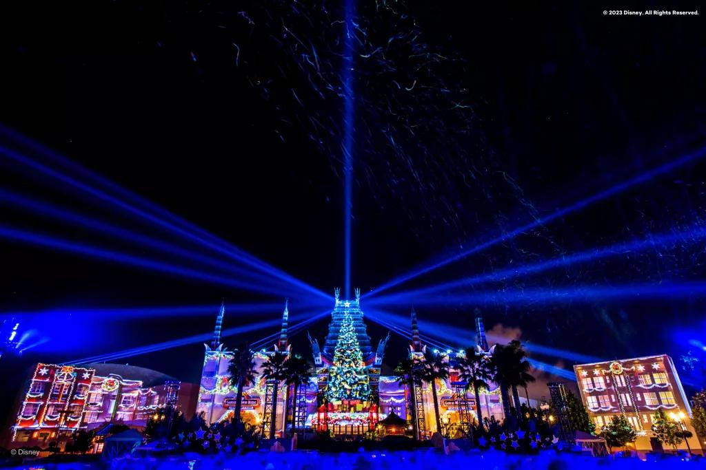 Jingle Bell Jingle Bam Lights projecting from Christmas tree