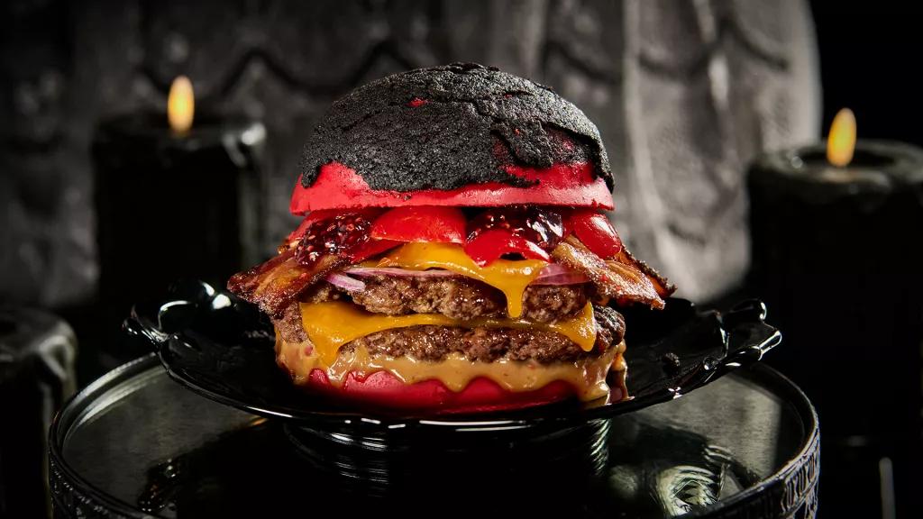 Peanut Blooder Smash Burger A double cheeseburger with bacon and peppers in a red brioche bun