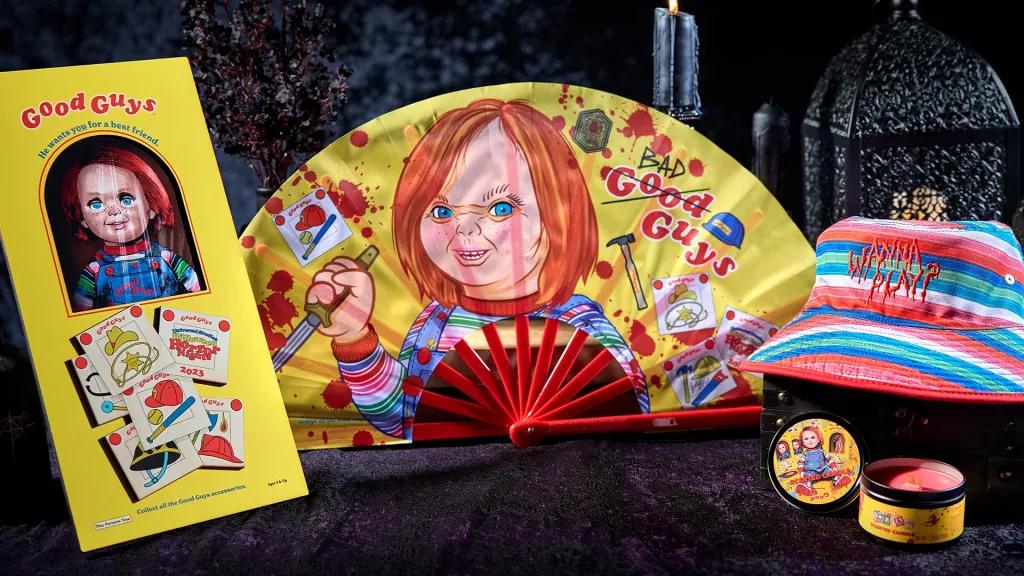 Chucky Merchandise at Halloween Horror Nights A Chucky themed fan, bucket hat and candle