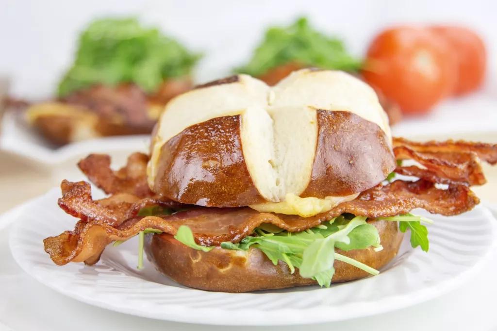 Cranberry Bacon Gouda Sandwich A pretzel roll filled with bacon, cheese and lettuce