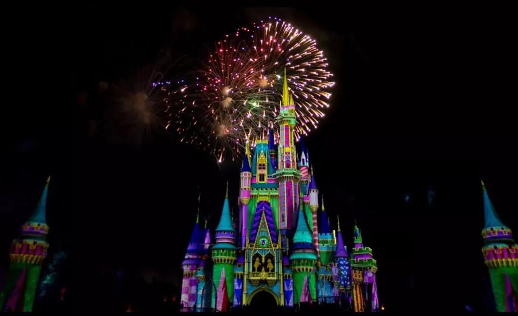 Minnie's Wonderful Christmastime Fireworks Cinderella Castle lit with projections and fireworks