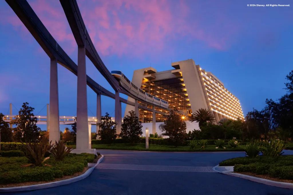 Disney's Contemporary Resort An a-frame hotel building with a monorail travelling out through the middle