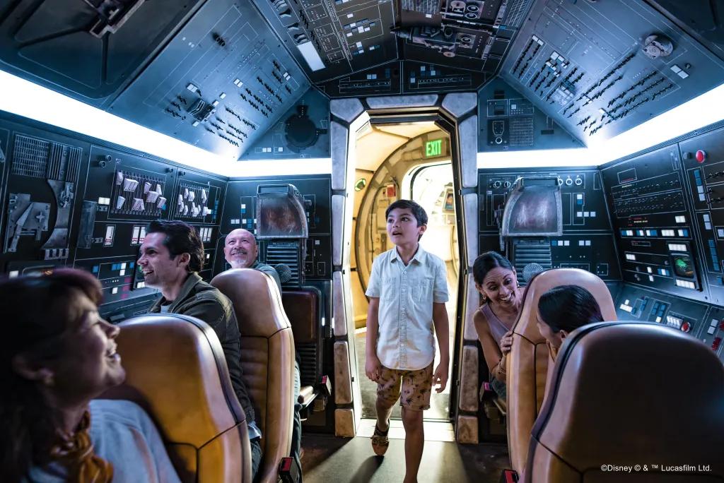 Millenium Falcon: Smugglers Run A young boy walking onto the Millenium Falcon Smugglers Run attraction