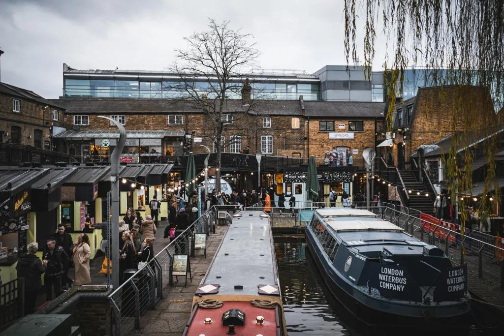 Camden Market People browsing market stalls in Camden Market next to the canal