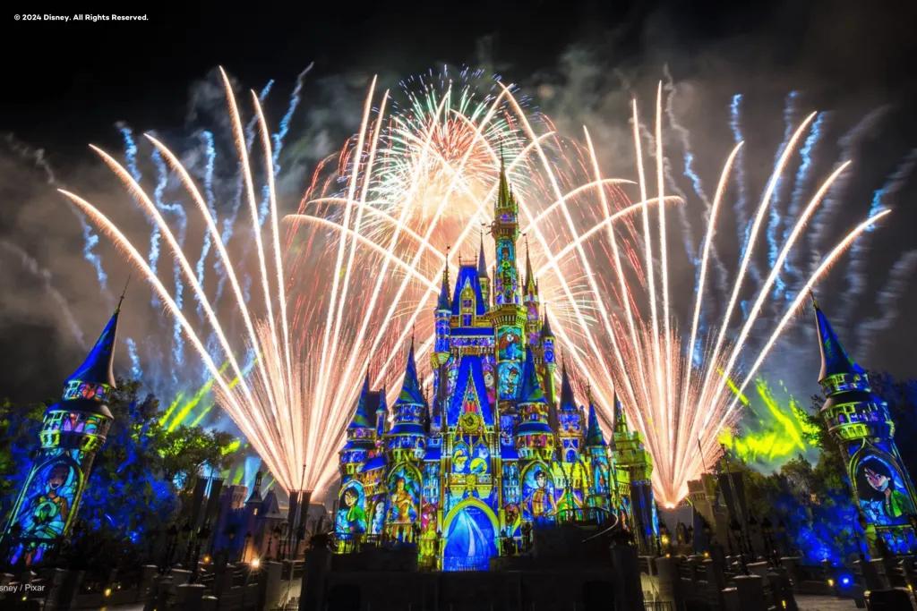 Happily Ever After Fireworks Cinderella Castle lit up with projections and fireworks going off overhead