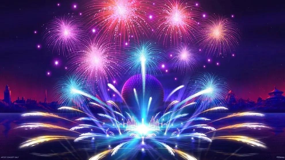 Luminous - The Symphony of Us Fireworks blasting off of lake in front of golf ball shaped building and bursting in the sky. There are many colours: turquoise, pink, orange, yellow and blue.