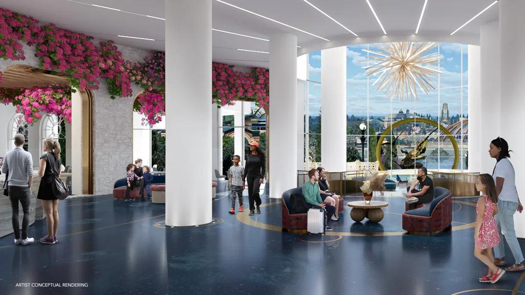 Universal Helios Grand Hotel Lobby Guests sat in white lobby with a gold chandelier hanging over their heads and pink bunches of flowers dangling. There is a large window in the background with Epic Universe peaking through.
