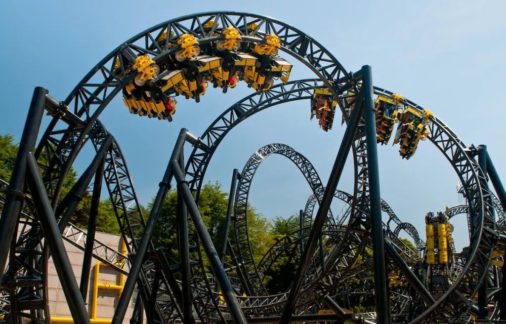 The Smiler at Alton Towers Cars going round a roller coaster with multiple loops and turns