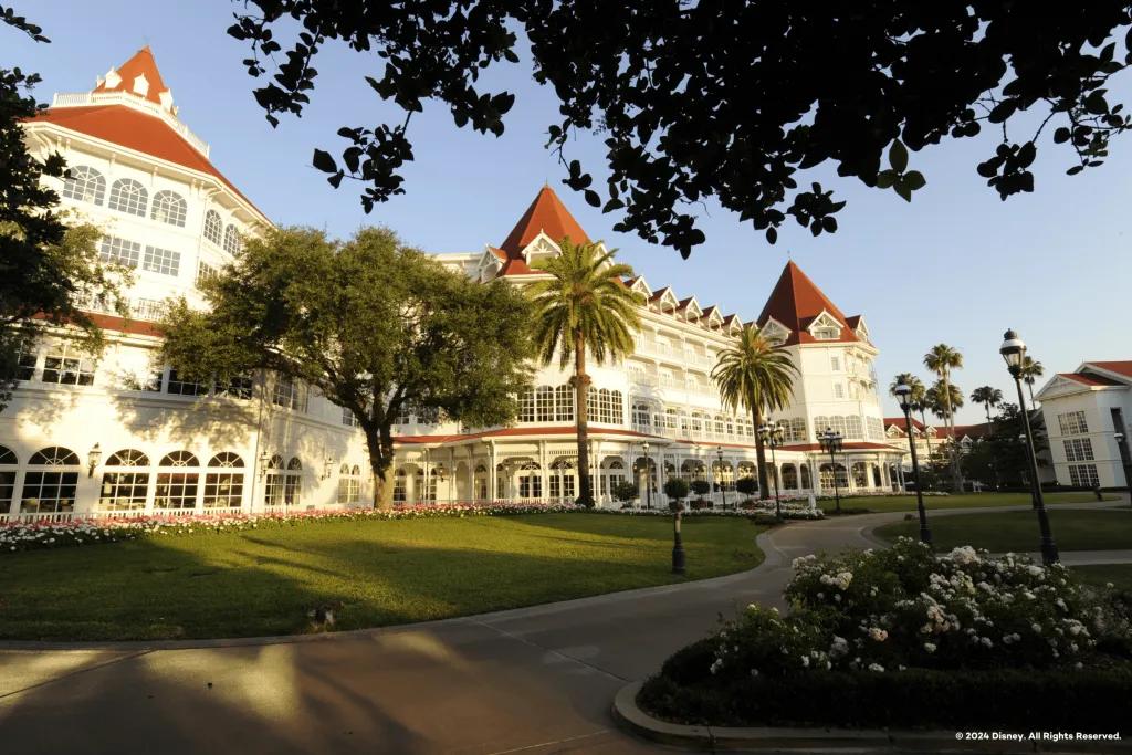 Disney's Grand Floridian Resort and Spa A victorian-era style hotel building with a white painted facade and red roof