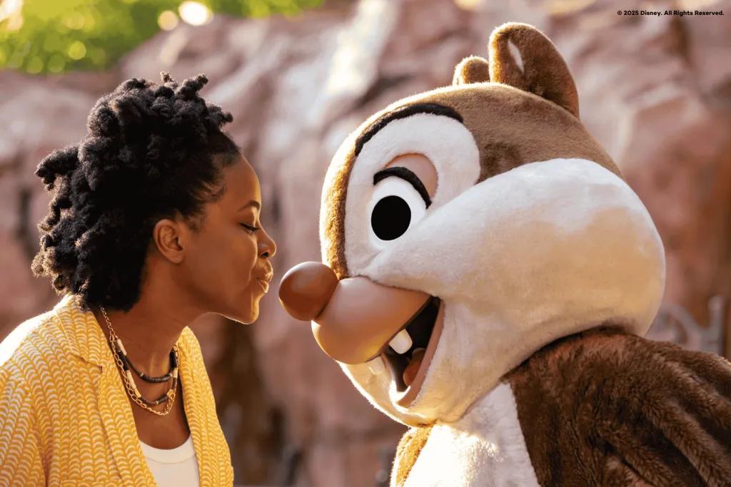 Meeting Chip and Dale at Walt Disney World A woman kissing Dale the chipmunk on the nose