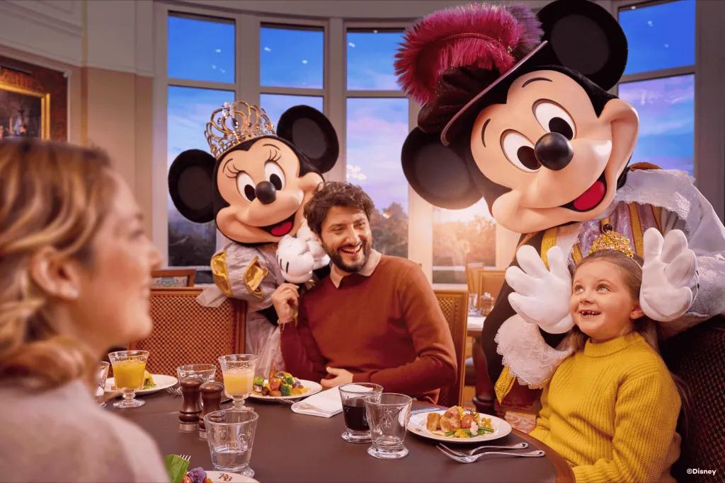 Royal Banquet at the Disneyland Hotel A family meeting Mickey and Minnie dressed in royal attire at Royal Banquet