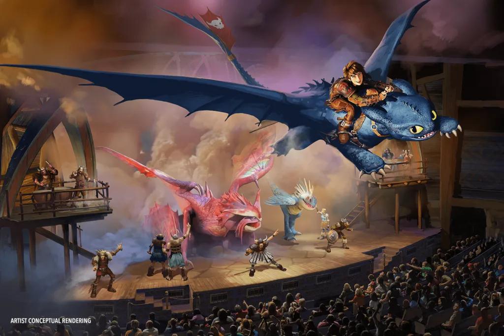 The Untrainable Dragon Dragons on the stage next to Vikings looking up at Toothless and Hiccup flying through the sky together above the audience.