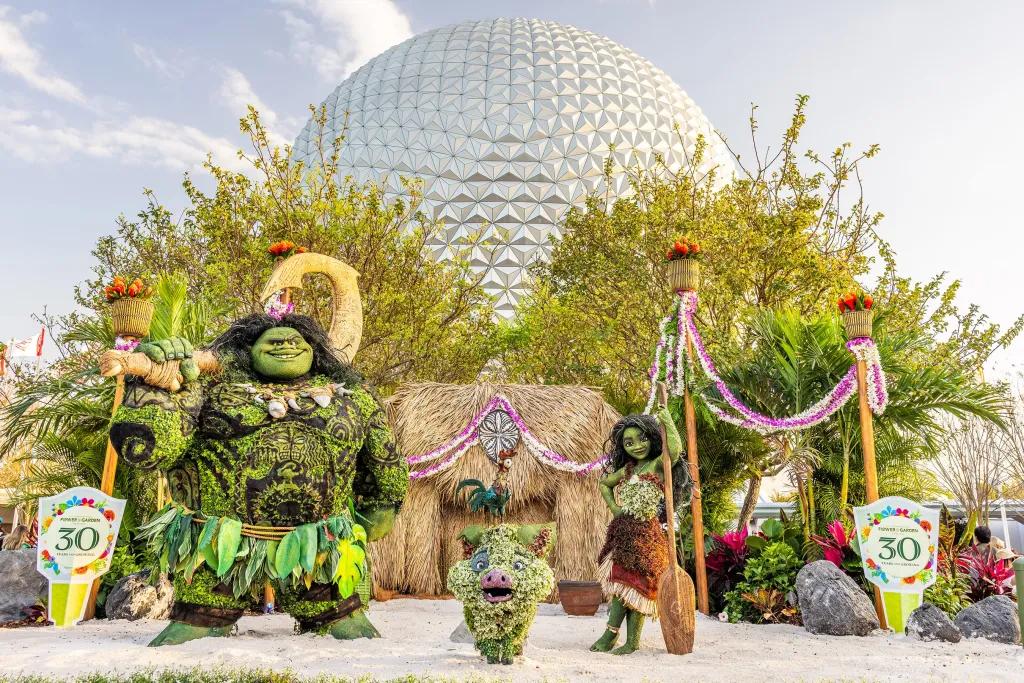 EPCOT Flower & Garden Festival Flower topiaries at the front of EPCOT park - Moana, Maui and a little pig made of flowers.