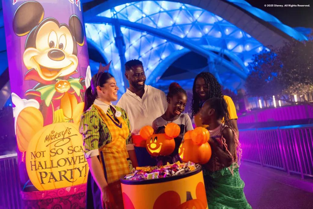 Trick or Treating at Mickey's Not-So-Scary Halloween Party A family in Halloween costumes trick or treating in Magic Kingdom