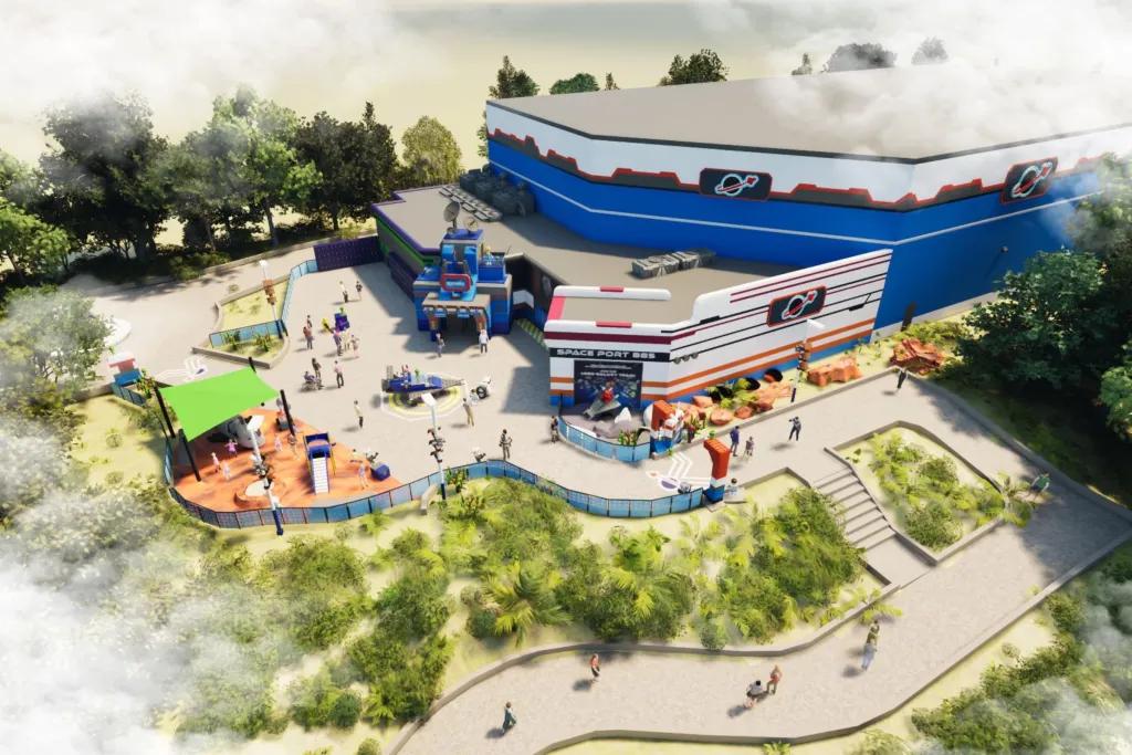 LEGOLAND Florida Artist concept of large blue and white building with entrance onto the large weaving path. On the building there are space themed signs including an outline of saturn.