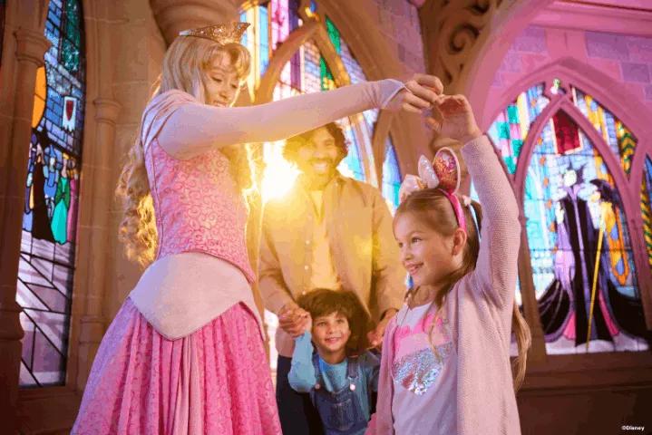 A young girl taking part in a Character Meet and Greet at Disneyland Paris