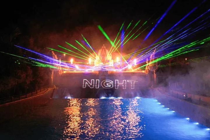 Strobe lights in front of a pool at Siam Night, Siam Park