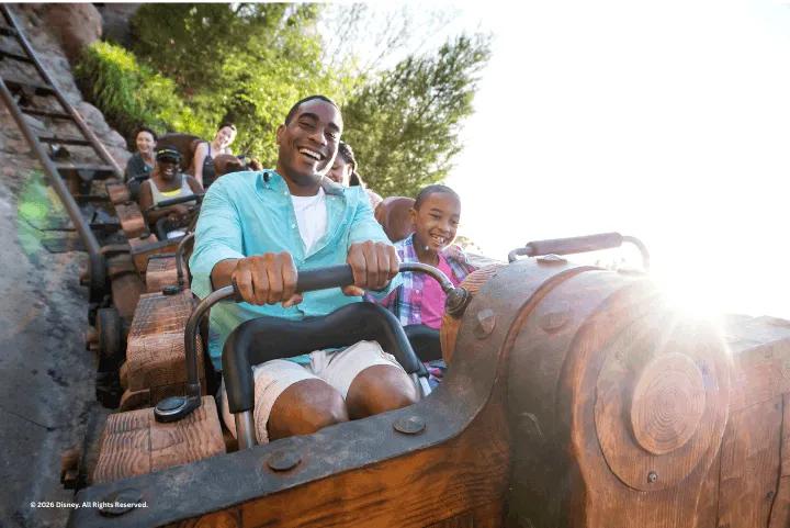 Guests on the Seven Dwarfs Mine Train at Walt Disney World