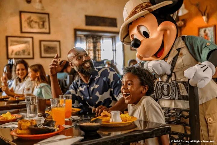 Guests with Mickey Mouse at Tusker House in Disney's Animal Kingdom Theme Park