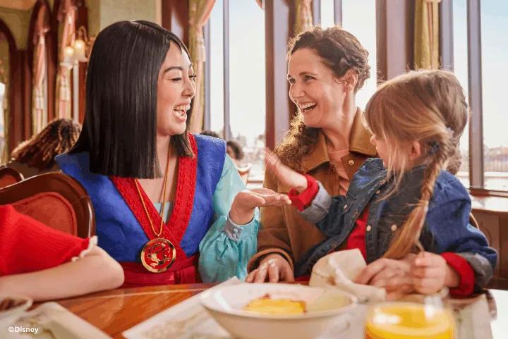 Guests at The Regal View Restaurant & Lounge, Disney Adventure World