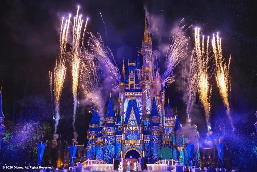 Fireworks over Cinderella Castle projected with Frozen-themed imagery during Mickey's Very Merry Christmas Party
