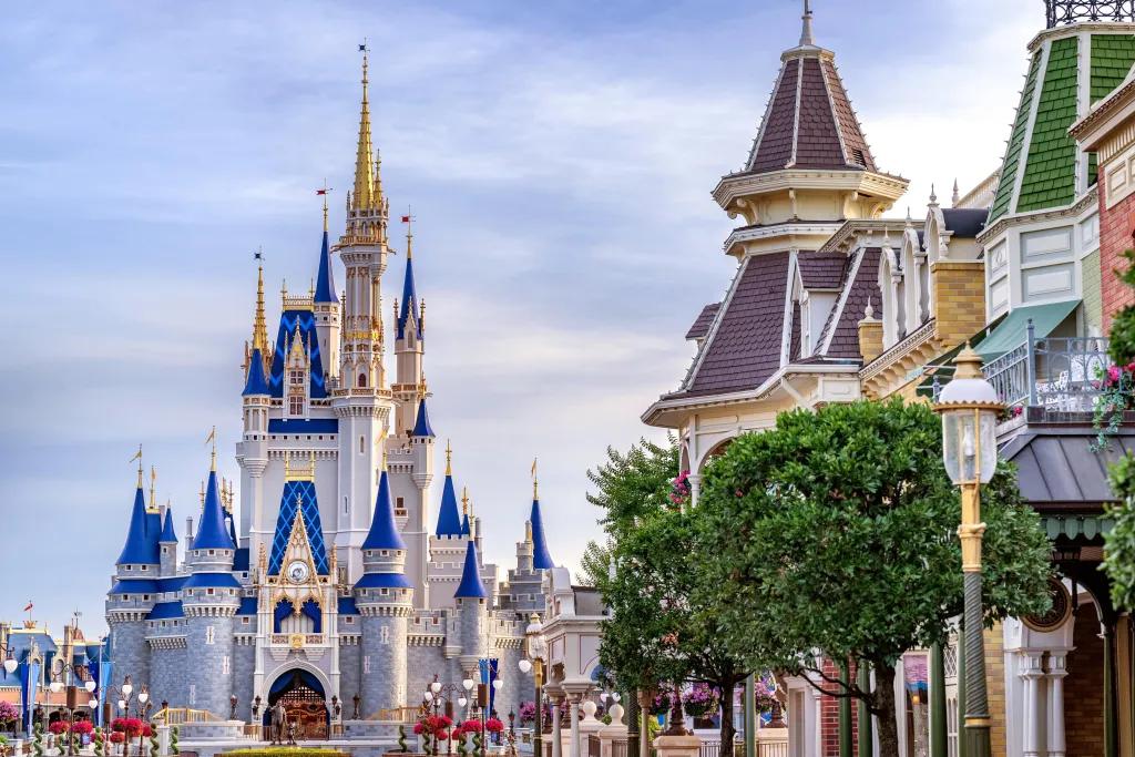 Cinderella Castle's blue-and-gold spires rising above Main Street U.S.A. at Magic Kingdom Park