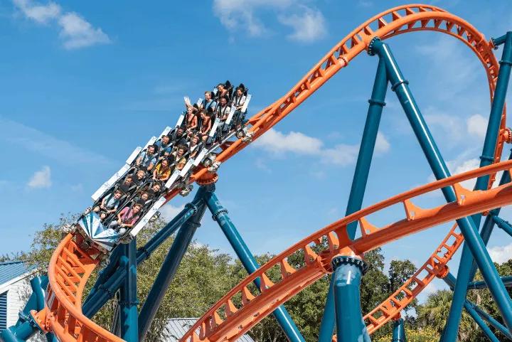 Ice Breaker's orange track twisting through steep drops and turns at SeaWorld Orlando