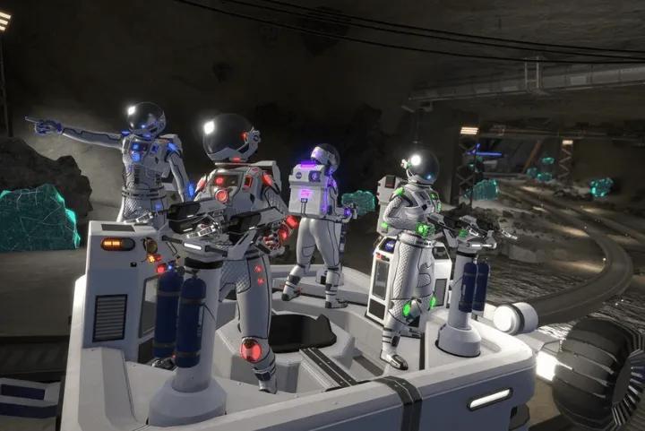 Four astronauts on a lunar rover inside a dark cave in the HyperDeck VR simulation