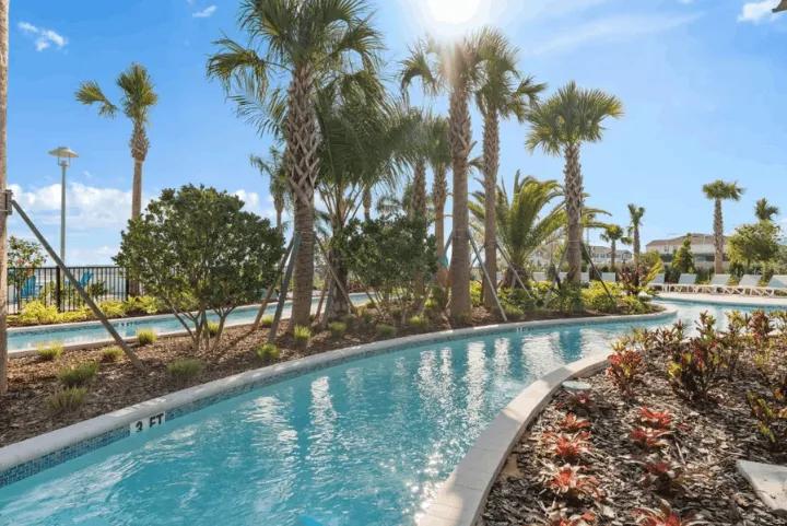 Lazy river surrounded by palm trees at Windsor Island Resort