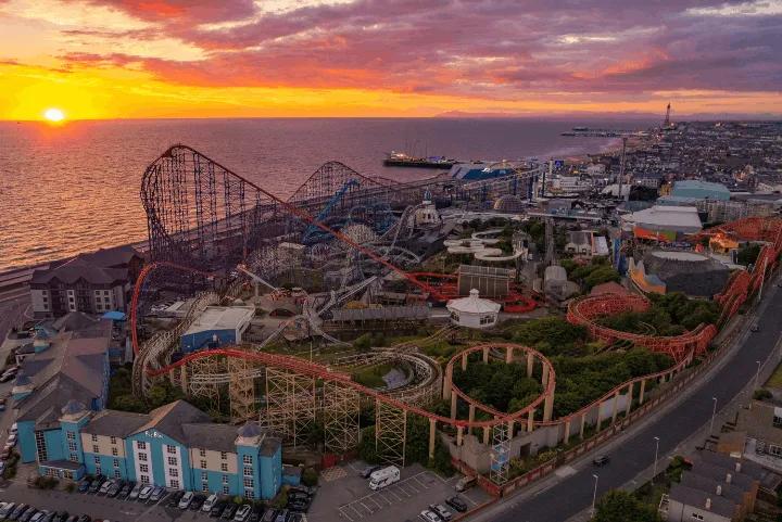 Aerial view of Blackpool Pleasure Beach at sunset