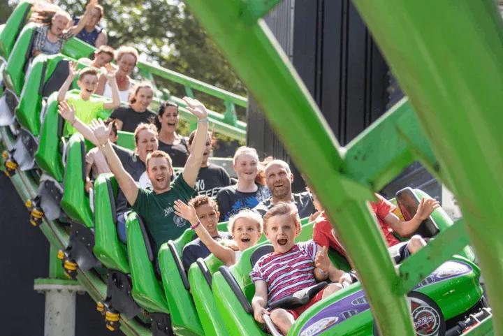 Riders enjoying The Wave roller coaster at Drayton Manor