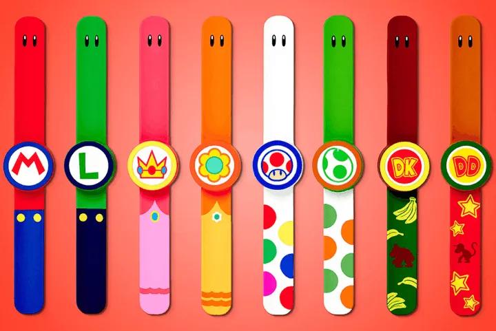 Eight colorful Nintendo-themed Power-Up Bands arranged in a row against a solid background