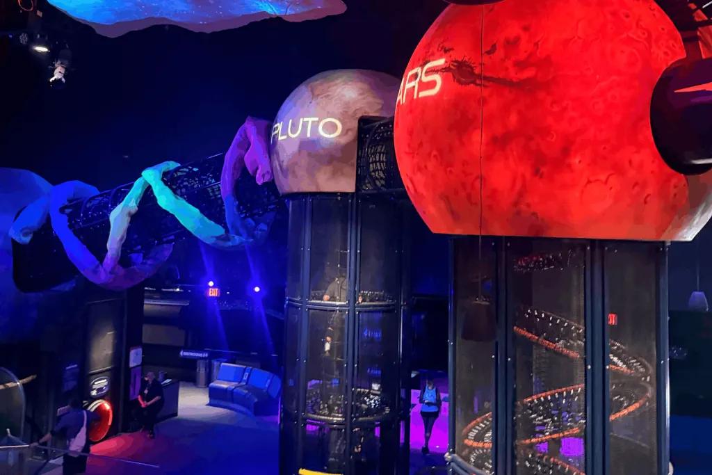 Climbing frames shaped as planets in the solar system 