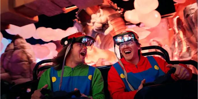 Happy guests enjoying a thrilling, immersive, and high-tech ride experience inside Universal Orlando Resort, showing how modern attractions are designed for diverse guest enjoyment and accessibility.