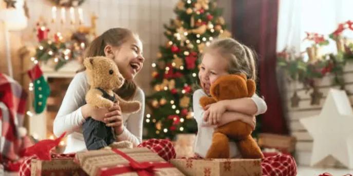 Children enjoying newly received toys on Christmas morning as part of a campaign to spread festive joy to children in need.