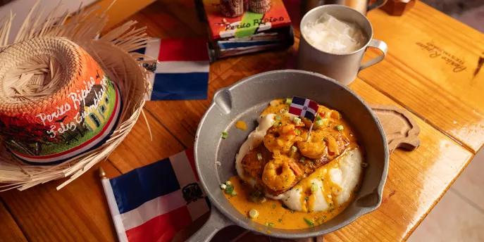 Delicious bowls of food with Latin American flag stuck in it.