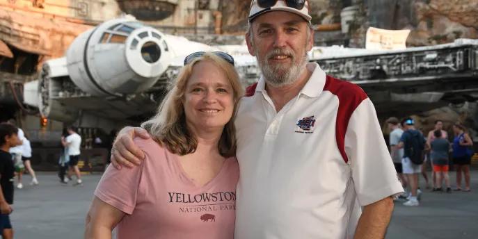 Couple in front of Millennium Falcon