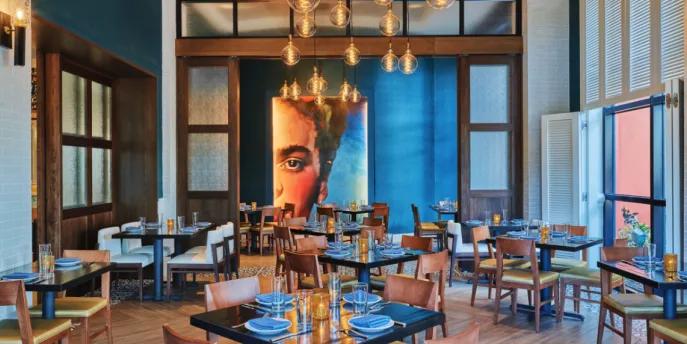 The modern, stylish interior of a restaurant at the Walt Disney World Dolphin Resort