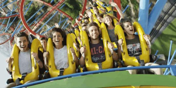 Four people on a roller coaster at PortAventura World