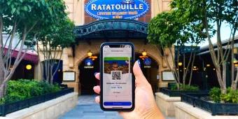 Customer showing a Standby Pass at the Ratatouille: The Adventure entrance at Disneyland Paris
