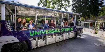 Guests in one of the new electric tram vehicles at Universal Studios Hollywood