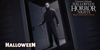 Michael Myers from Halloween standing in a doorway holding a knife